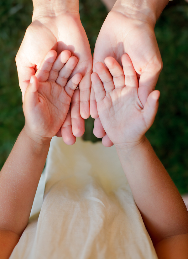 Child showing hands
